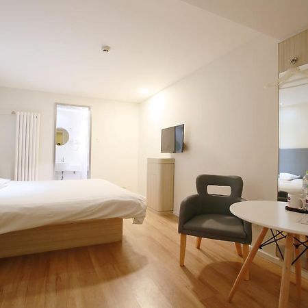 ฮั่นถิง โฮเต็ล ปักกิ่ง เอเชียนเกมส์ วิลเลจ Hotel ภายนอก รูปภาพ