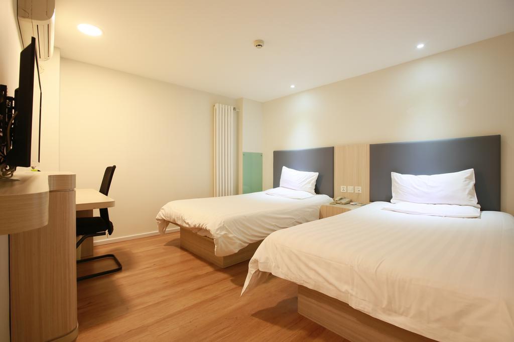 ฮั่นถิง โฮเต็ล ปักกิ่ง เอเชียนเกมส์ วิลเลจ Hotel ภายนอก รูปภาพ