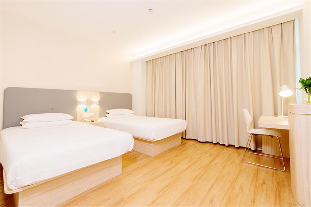ฮั่นถิง โฮเต็ล ปักกิ่ง เอเชียนเกมส์ วิลเลจ Hotel ภายนอก รูปภาพ