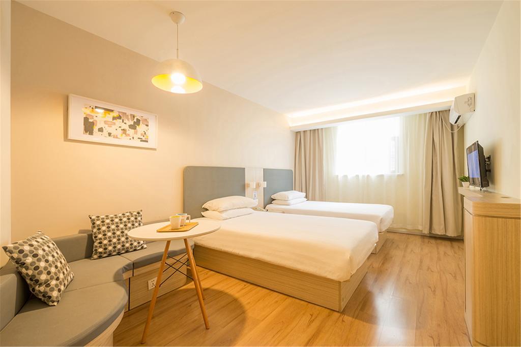 ฮั่นถิง โฮเต็ล ปักกิ่ง เอเชียนเกมส์ วิลเลจ Hotel ภายนอก รูปภาพ