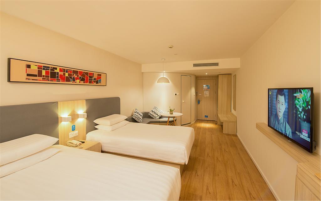 ฮั่นถิง โฮเต็ล ปักกิ่ง เอเชียนเกมส์ วิลเลจ Hotel ภายนอก รูปภาพ